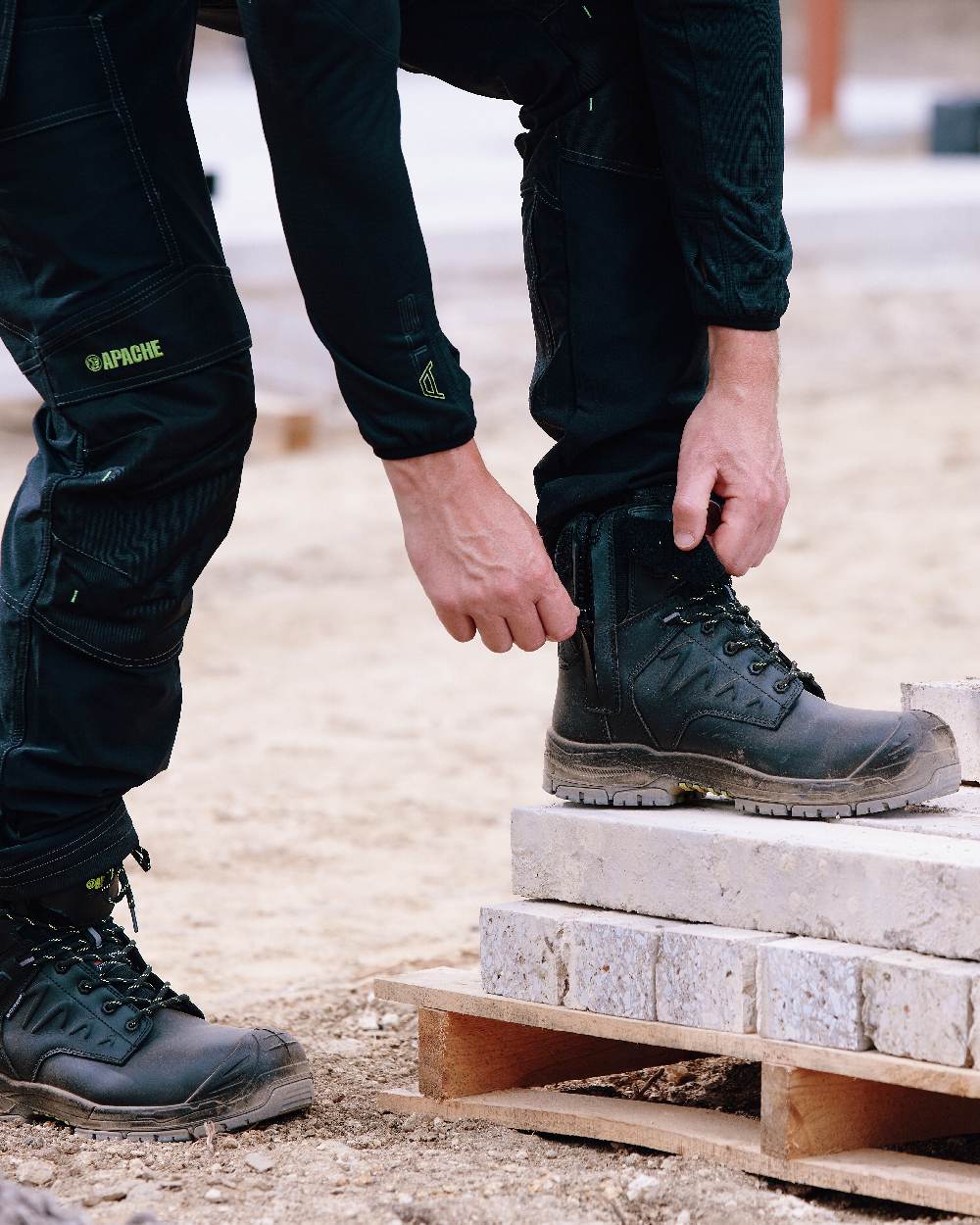 Black Coloured Apache Mens Chilliwack Side Zip Waterproof Safety Boots on outdoor background
