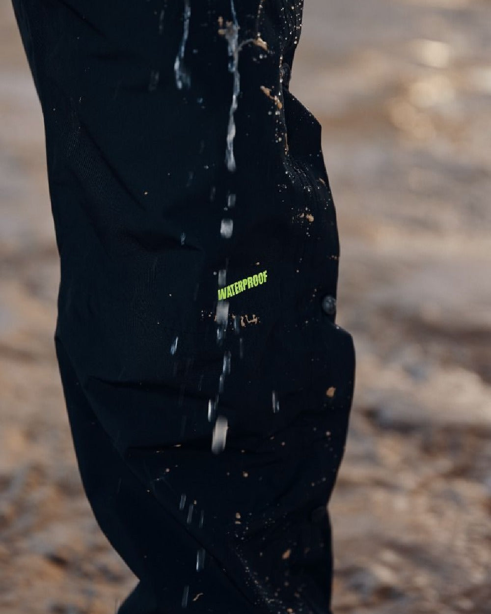Black Coloured Apache Mens Quebec Waterproof Over Trousers on outdoor background