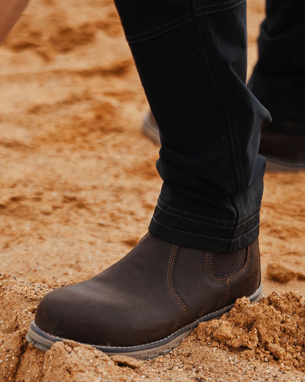 Brown Coloured Apache Mens Water Resistant Flyweight Dealer Boots on outdoor background