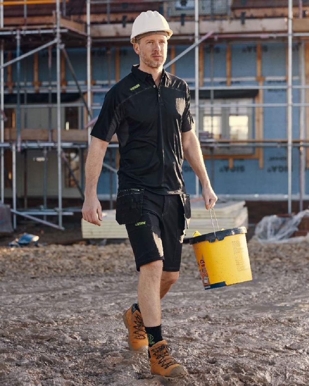 Black Coloured Apache Mens Whistler 4 Way Stretch Shorts on outdoor background