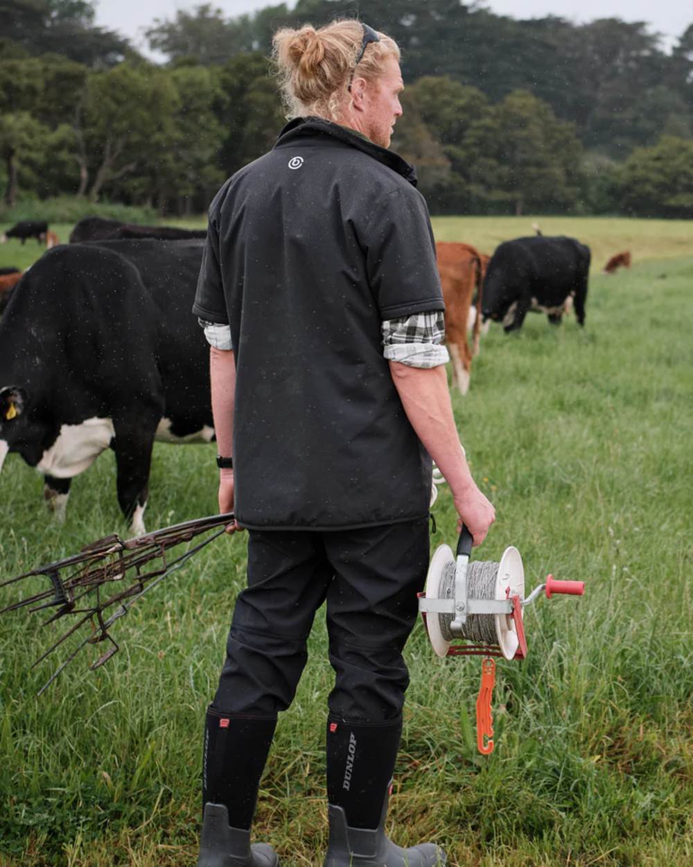 Jet Black coloured Betacraft Mens Gully Short Sleeve Jacket on outdoor background
