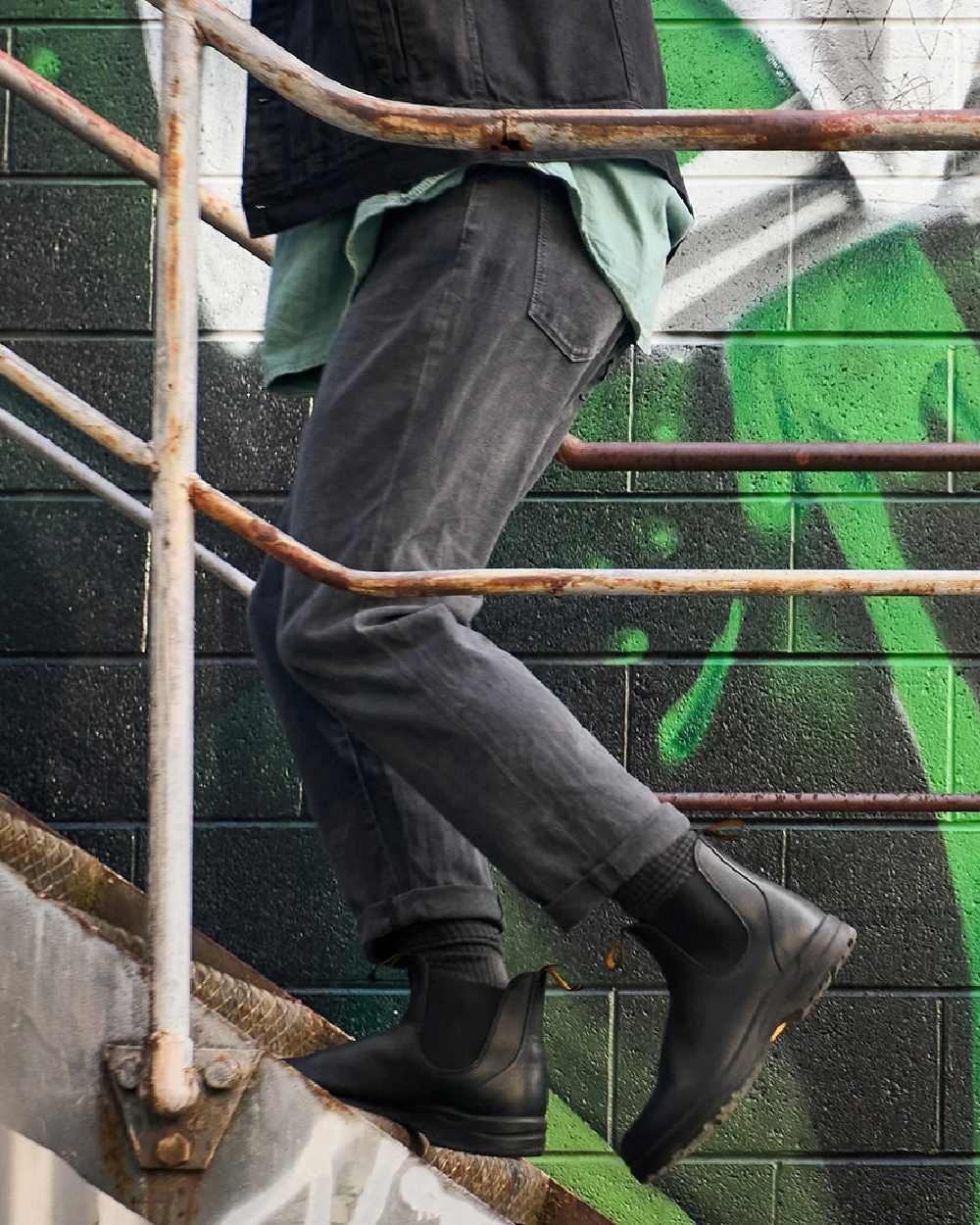 Black Coloured Blundstone 2058 Black Chelsea Boots on outdoor background