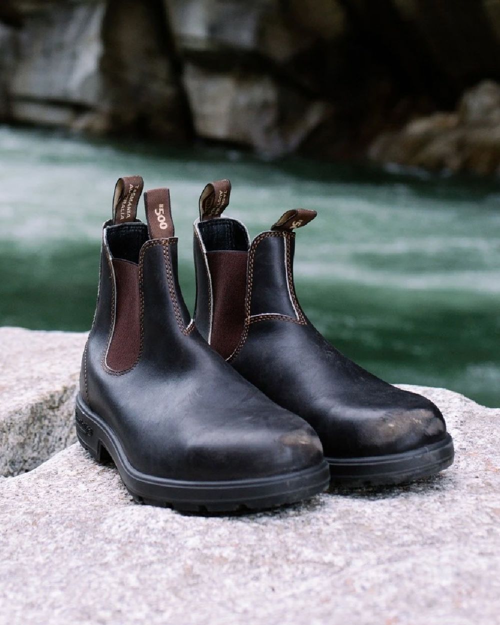 Stout Brown coloured Blundstone Original 500 Chelsea Boots on waterfall background