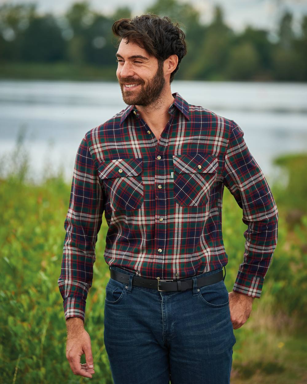 Blue coloured Champion Kempton Work Shirt on pond background