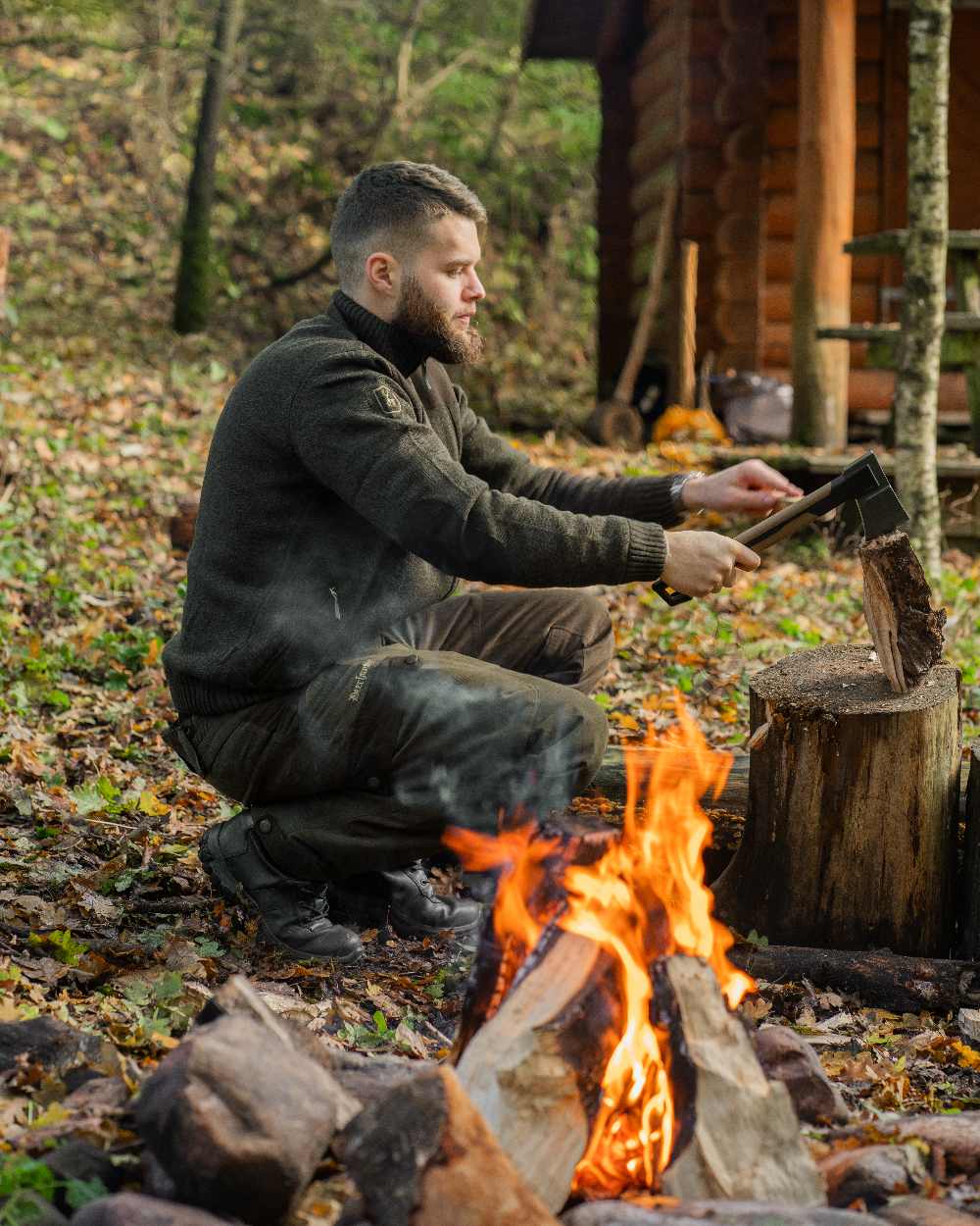 Dark Elm Melange coloured Deerhunter Carlisle Knit Cardigan With Stormliner on forest background