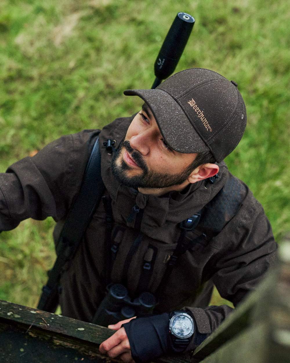 Wood coloured Deerhunter Game Cap on blurry background