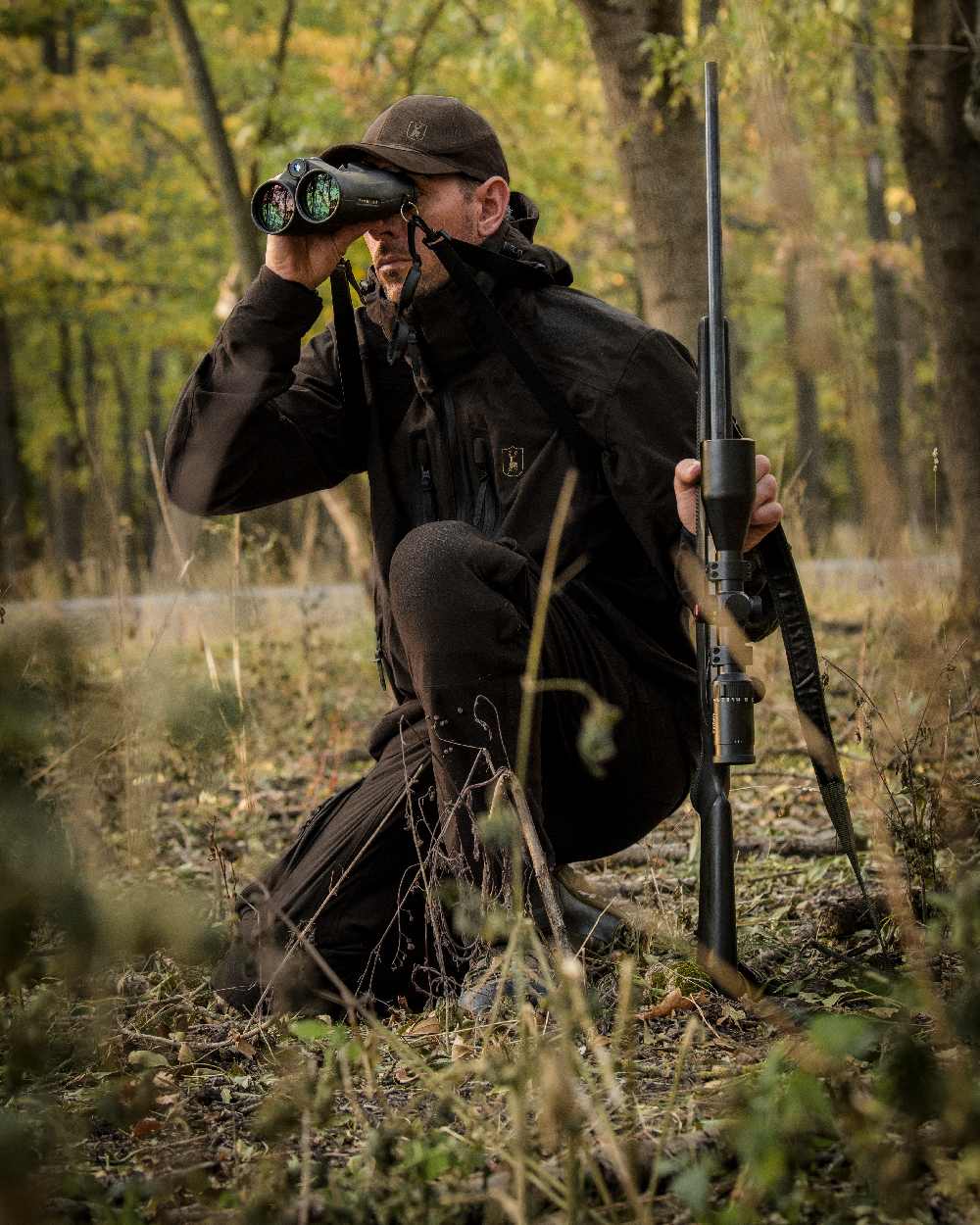 Wood coloured Deerhunter Game Pro Light Jacket on forest background