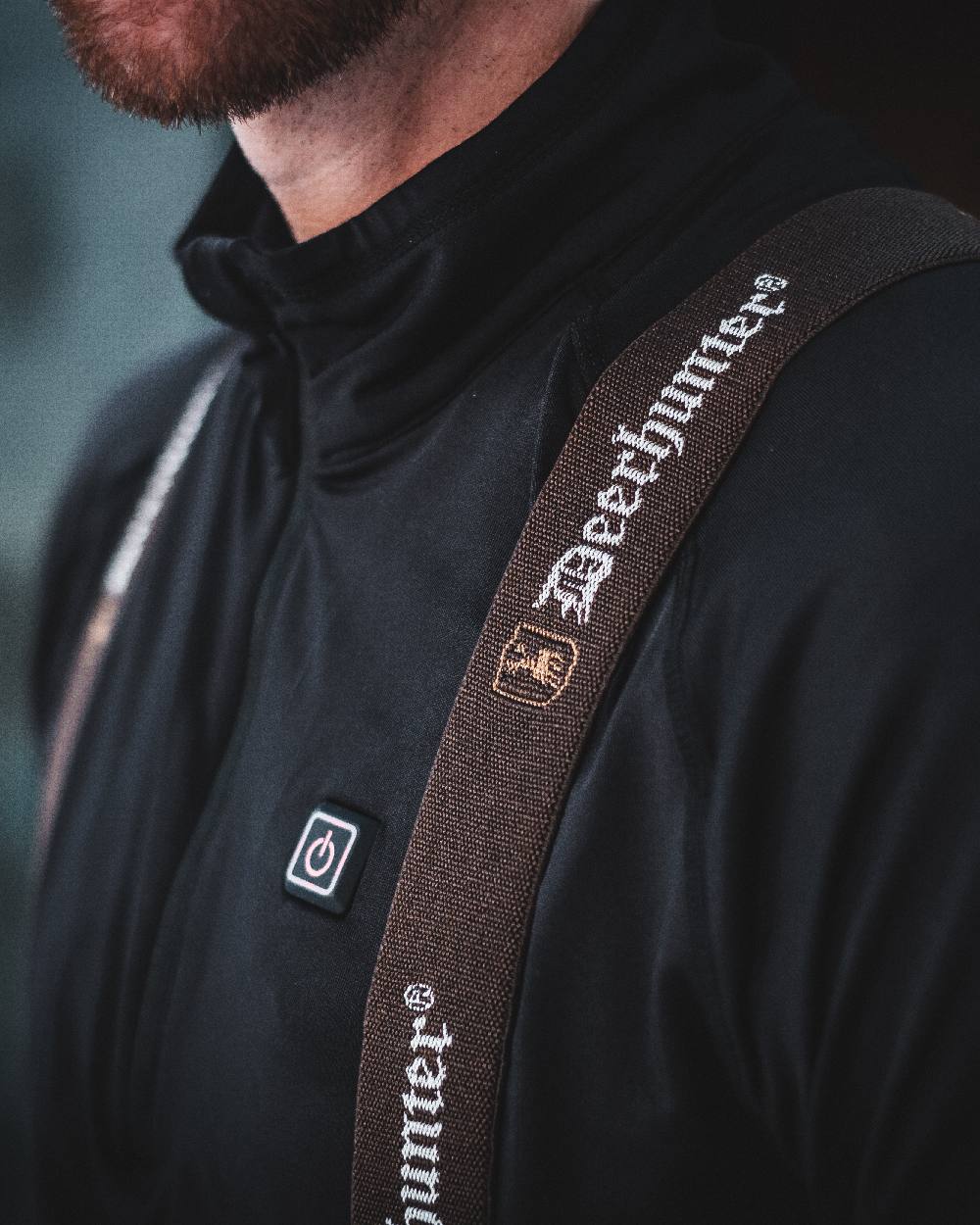 Black coloured Deerhunter Heat Undershirt with Zip Neck on blurry background