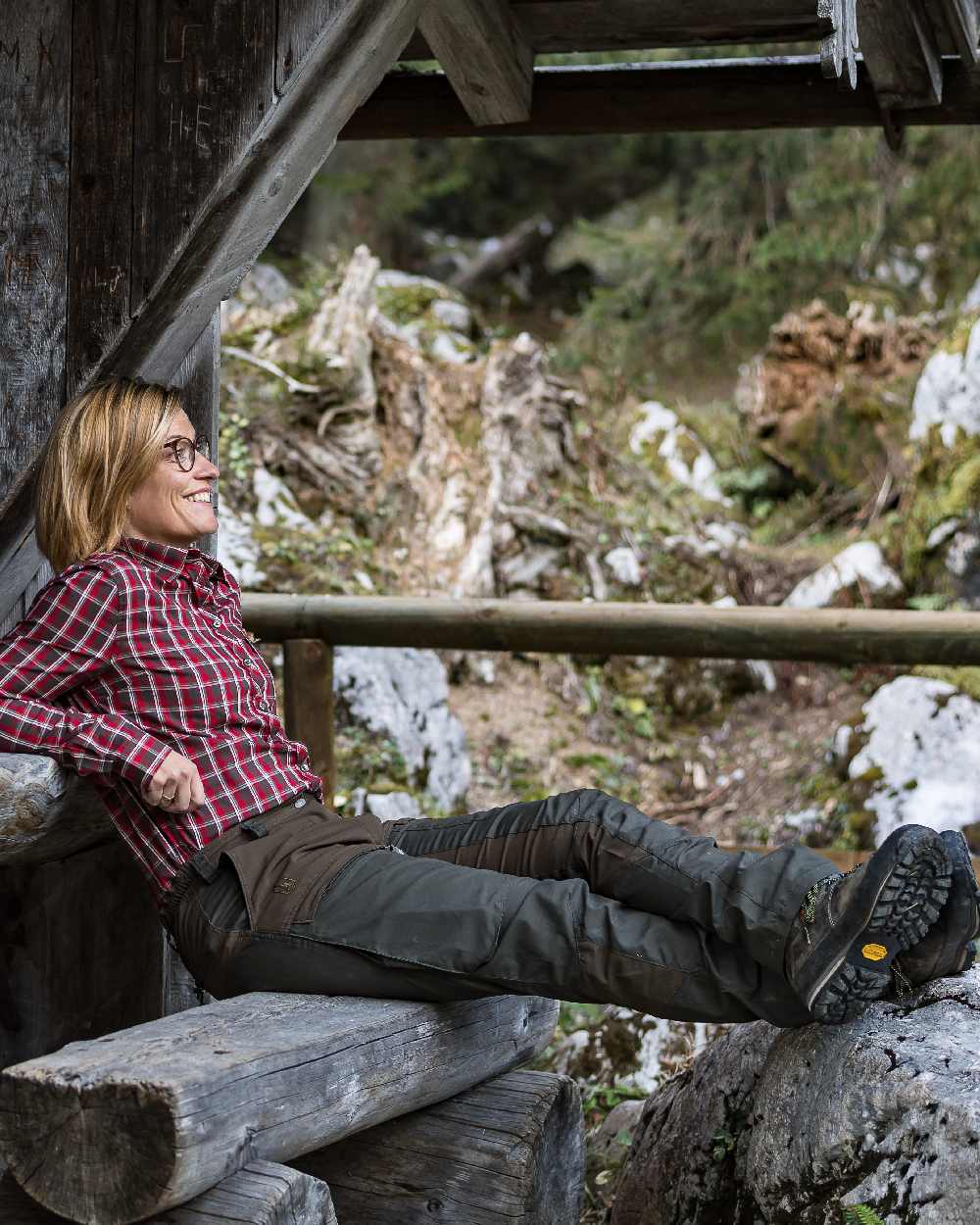 Deep Green coloured Deerhunter Lady Ann Trousers on forest background