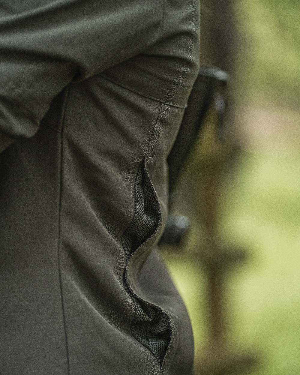 Forest Green coloured Deerhunter Lady Canopy Shirt on blurry background
