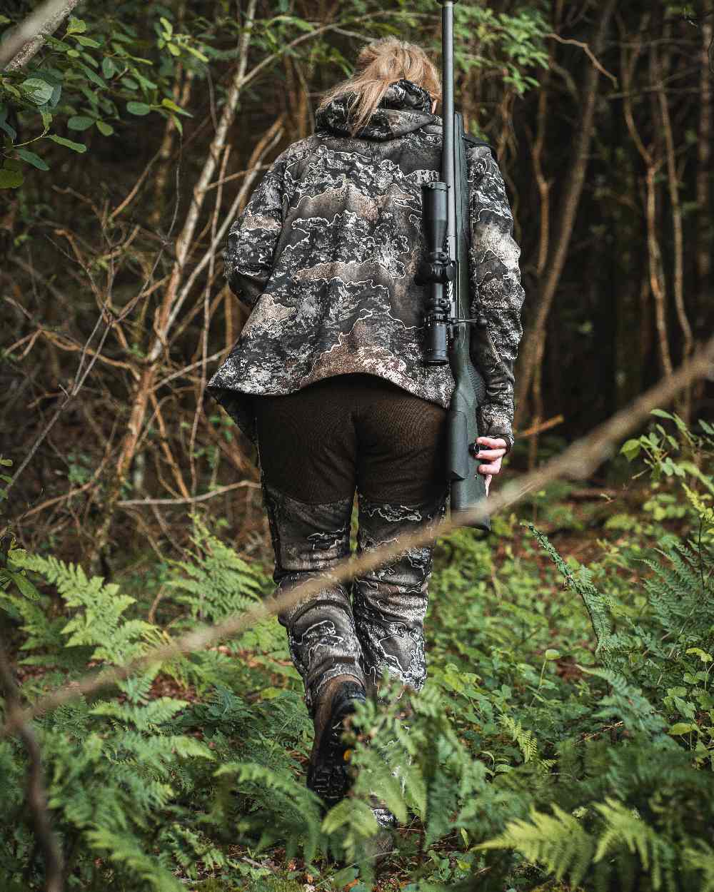 Realtree Excape coloured Deerhunter Lady Excape Softshell Jacket on forest background