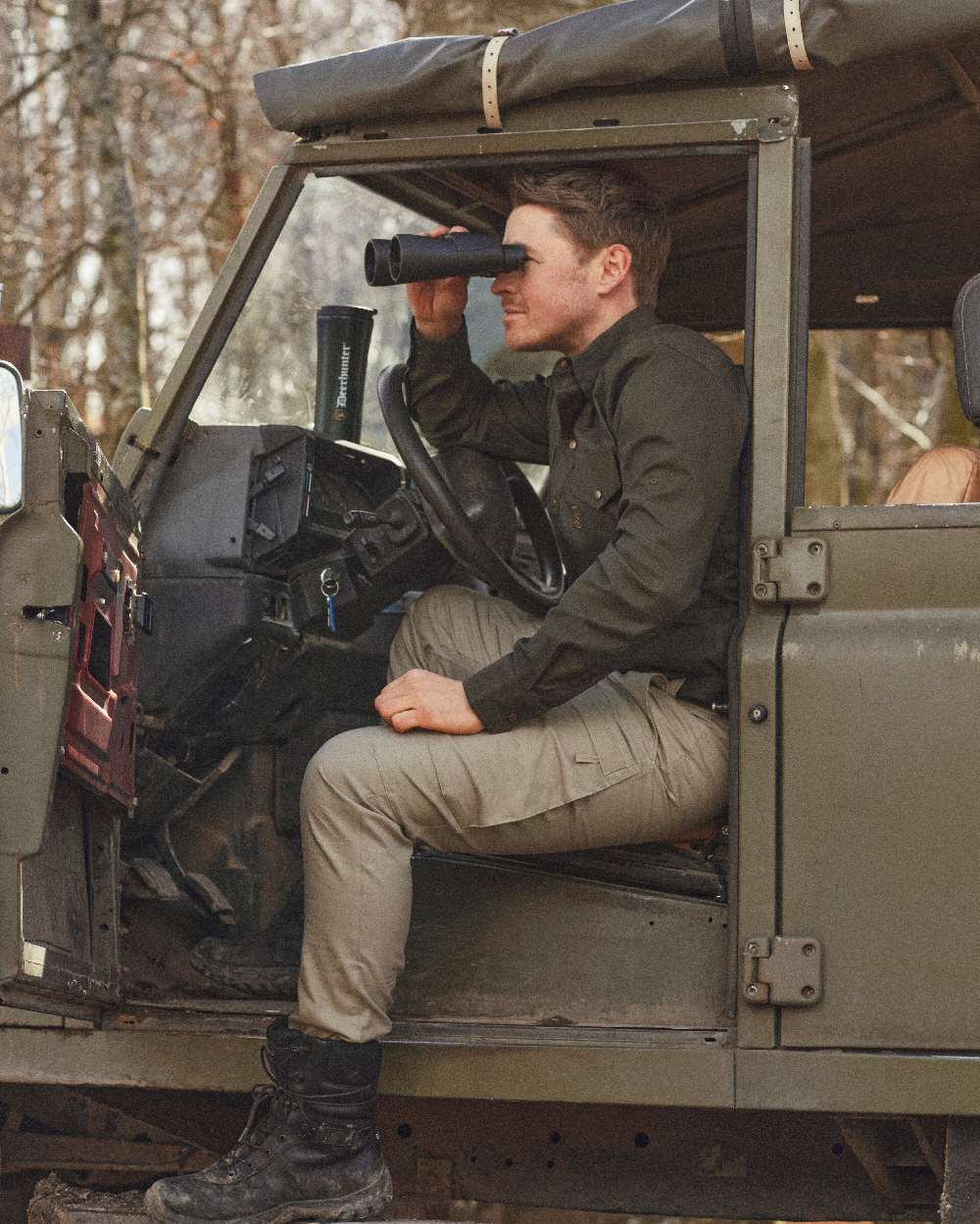 Beige coloured Deerhunter Matobo Trousers on jeep background