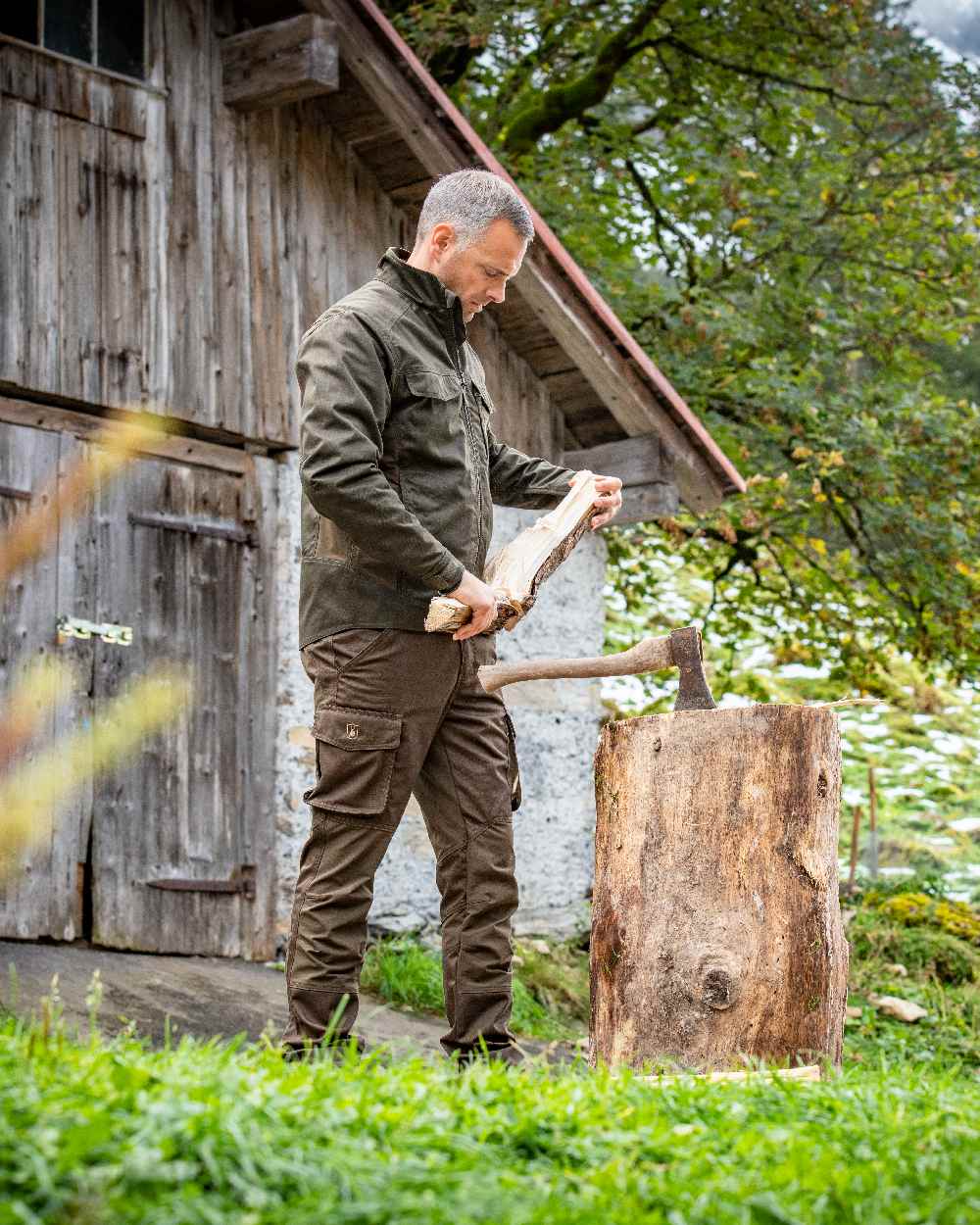 Fallen Leaf Coloured Deerhunter Rogaland Stretch Trousers on log house background