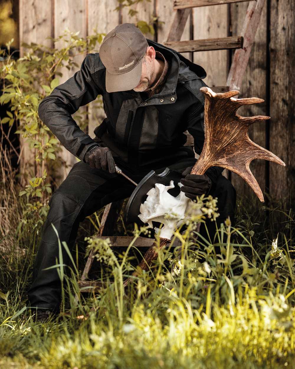 Black Ink coloured Deerhunter Strike Trousers on forest background