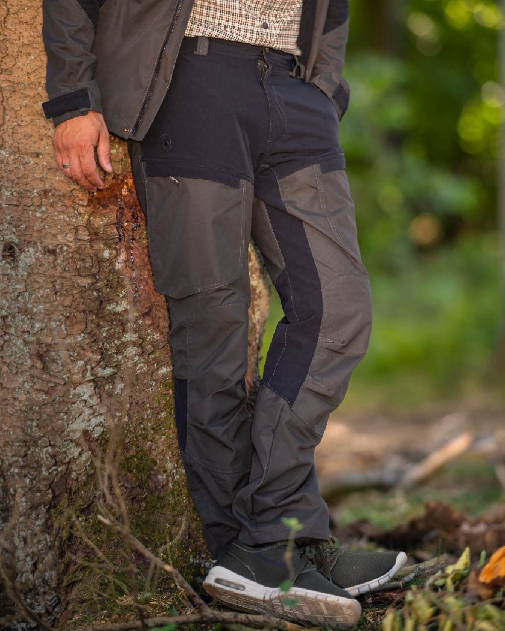 Black Ink coloured Deerhunter Strike Trousers on forest background