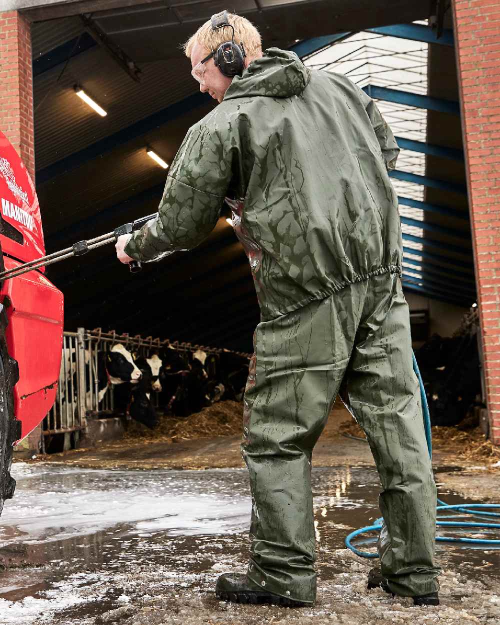 Olive Coloured Elka Light Waist Trousers on construction background