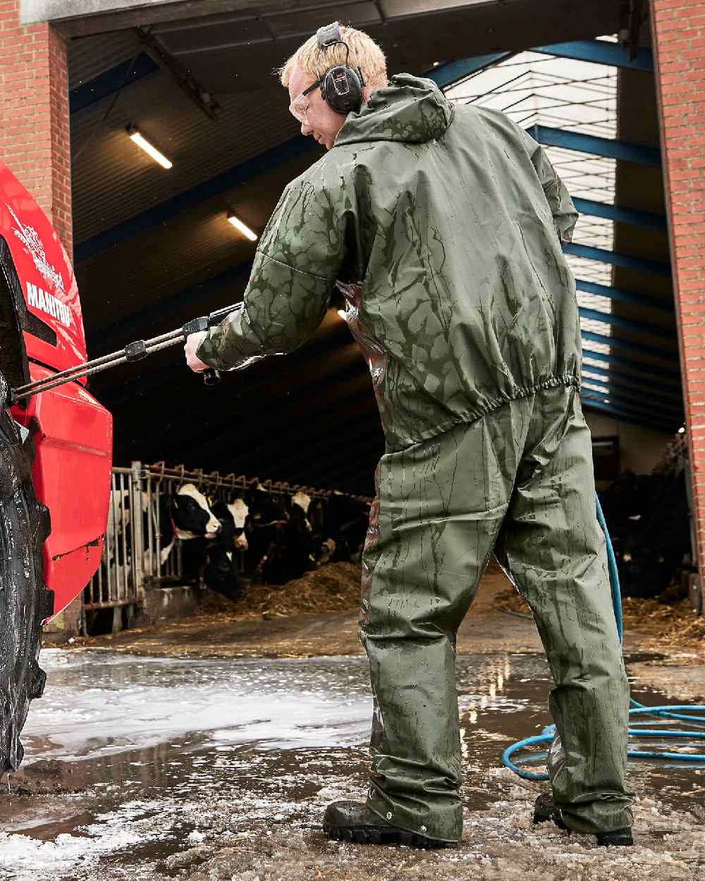 Olive Coloured Elka Light Jacket on construction background