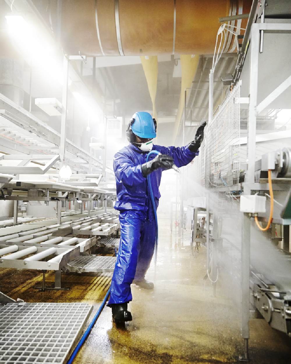 Cobalt Coloured Elka Mens Pro Waist Trousers on factory background