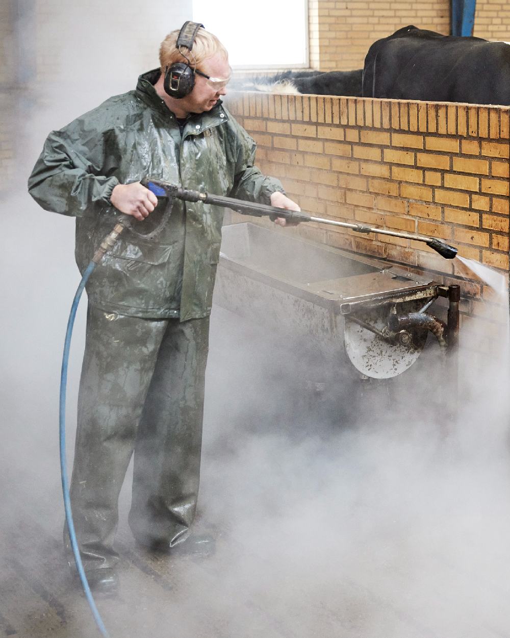 Olive Coloured Elka Professional Jacket on barn background