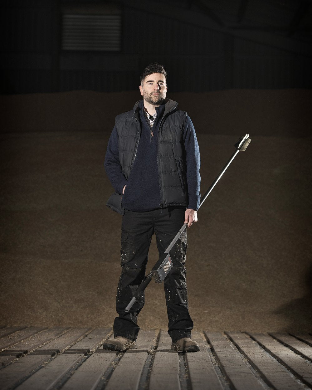 Black coloured Fort Downham Bodywarmer on brown background