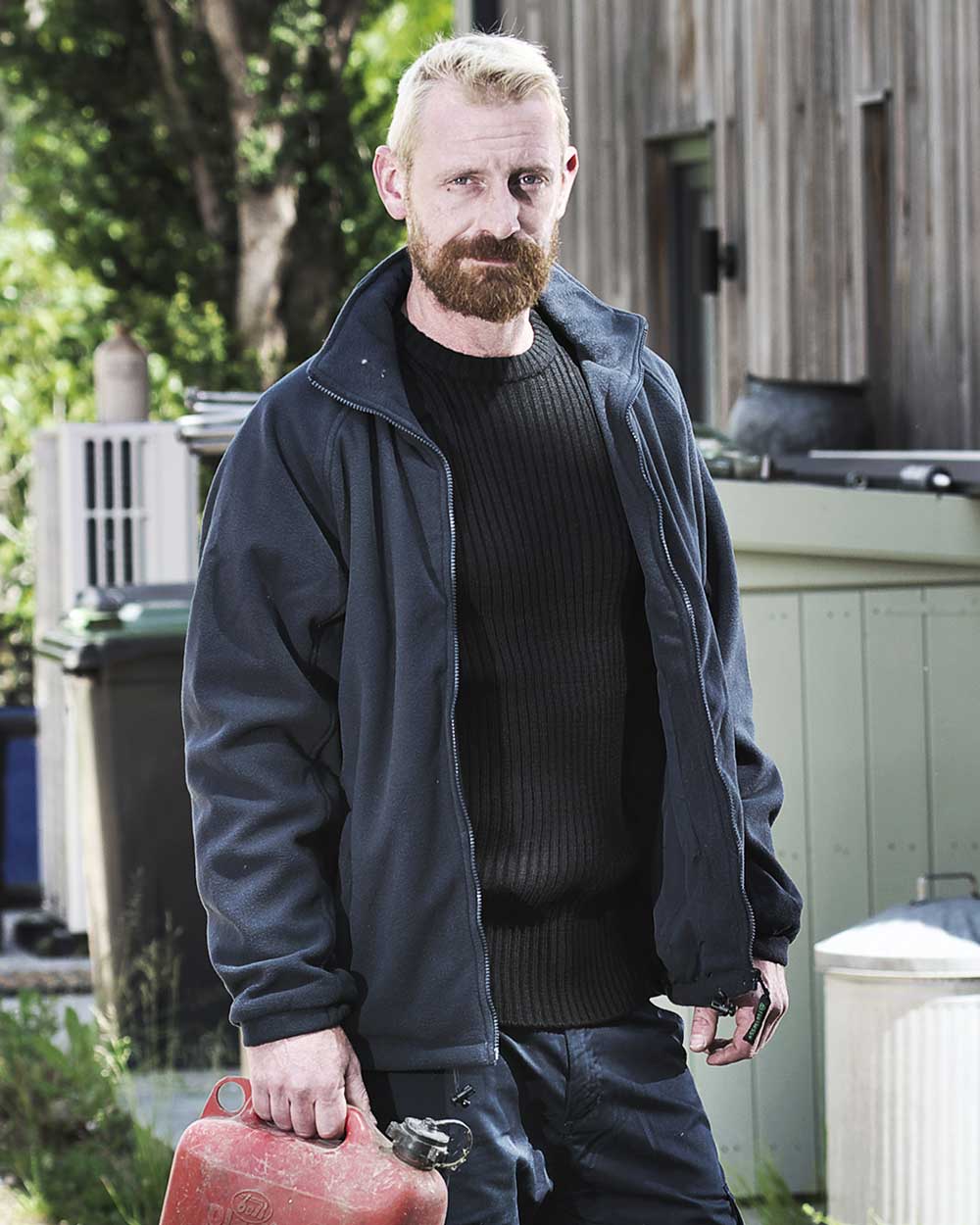 Navy Blue coloured Fort Lomond Fleece Jacket on blurry background