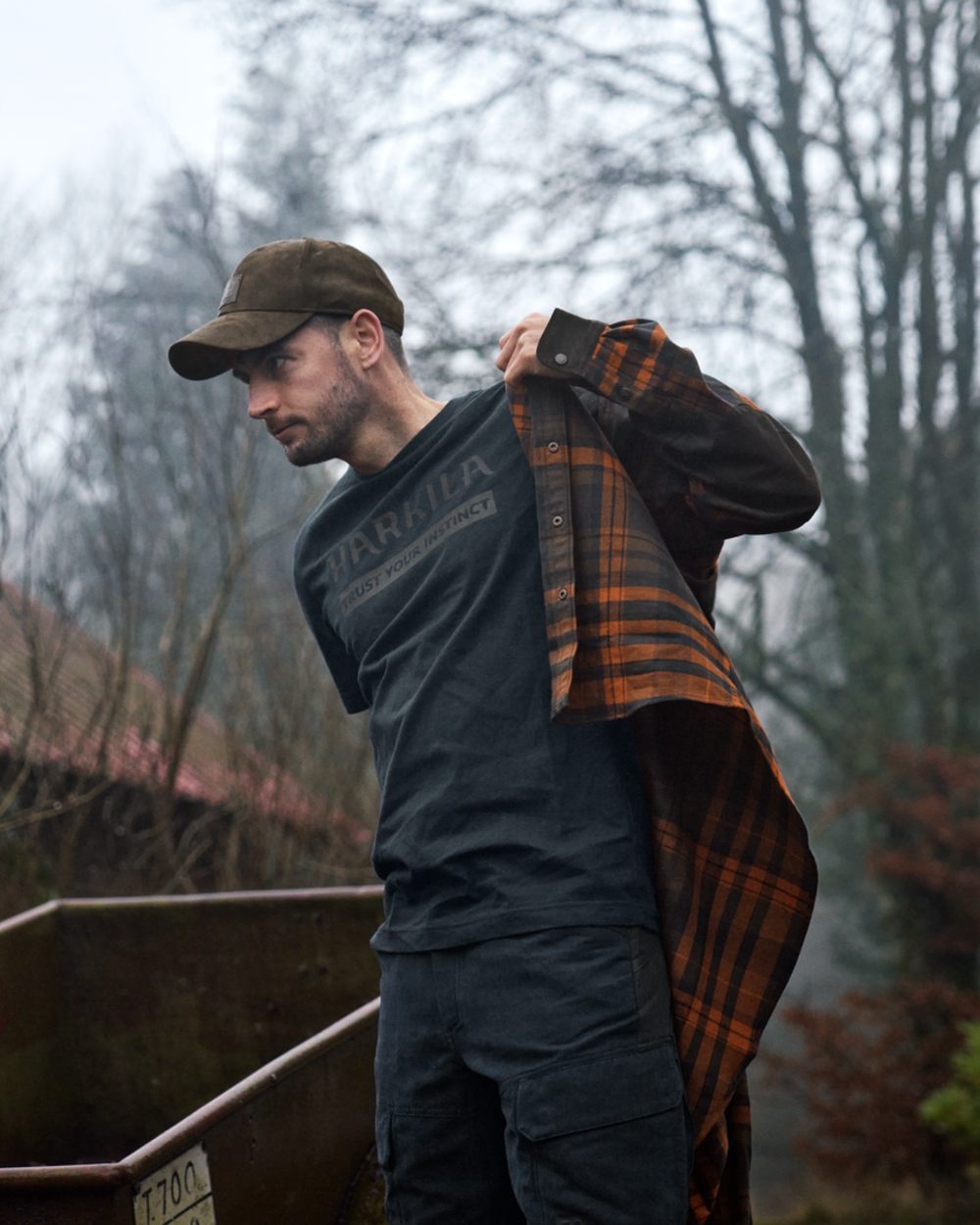 Dark Navy Coloured Harkila logo Short Sleeve T-Shirt on white background