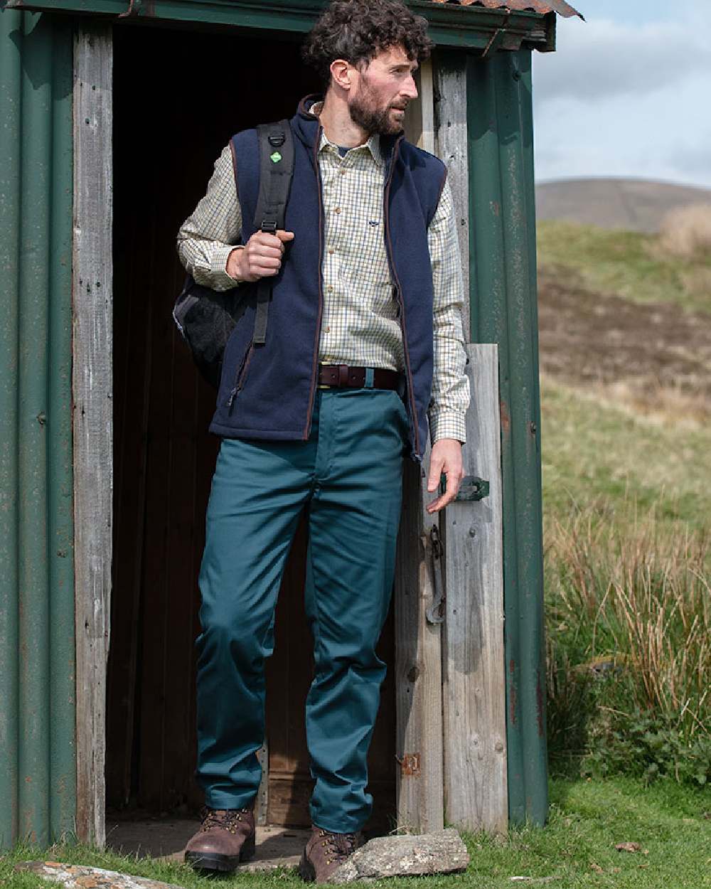 Spruce Coloured Hoggs of Fife Bushwhacker Thermal Stretch Trousers on countryside background