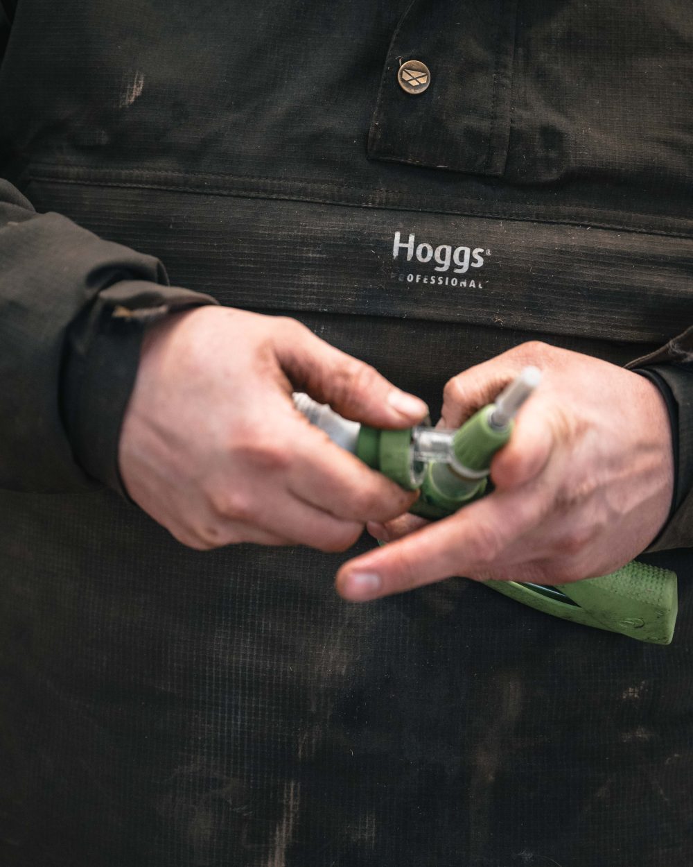Green Coloured Hoggs of Fife Green King II Waterproof Smock on outdoor background
