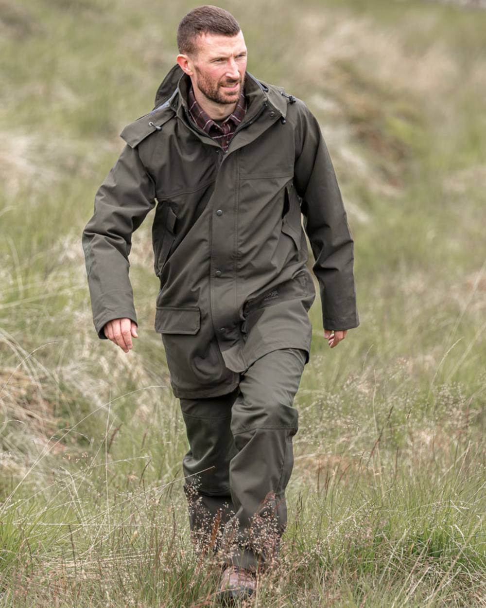 Green Coloured Hoggs of Fife Green King II Waterproof Trousers on white background