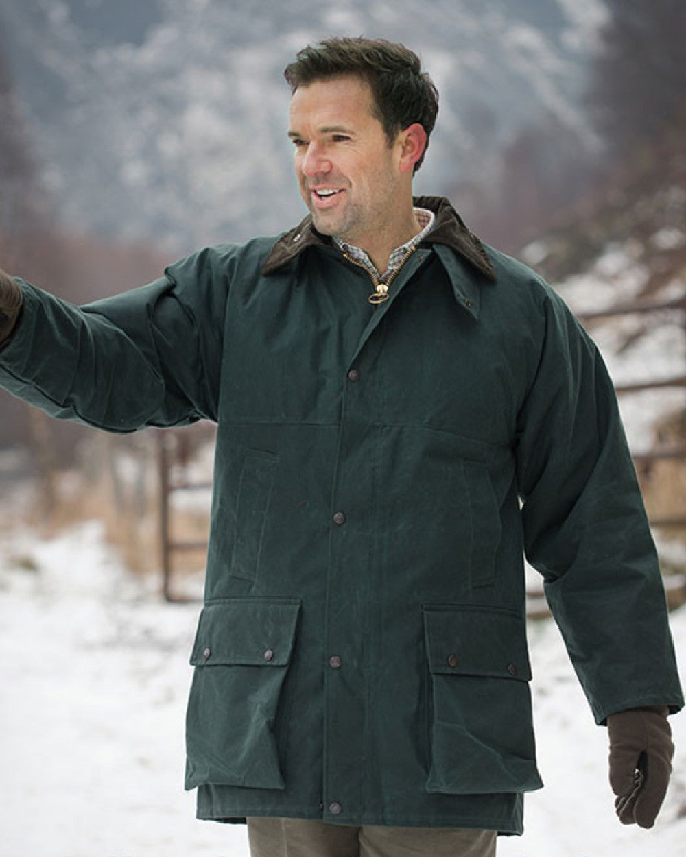 Olive Coloured Hoggs of Fife Padded Waxed Jacket on snow background