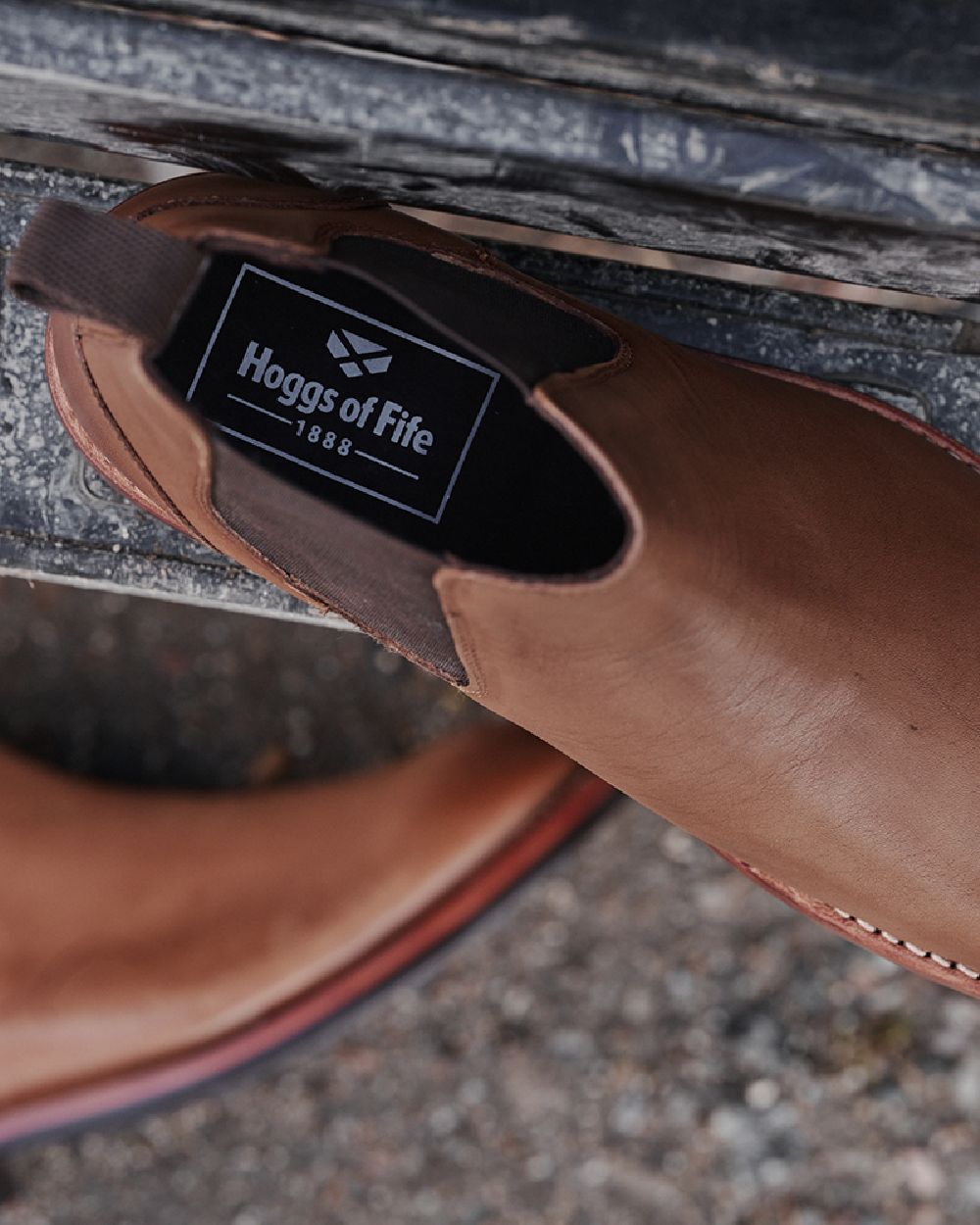 Burnished Tan Coloured Hoggs of Fife Perth Dealer Boot on ground background