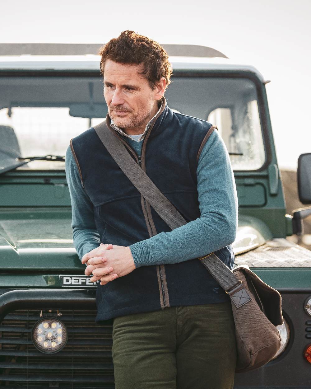 Midnight Navy coloured Hoggs of Fife Stenton Technical Fleece Gilet on car background