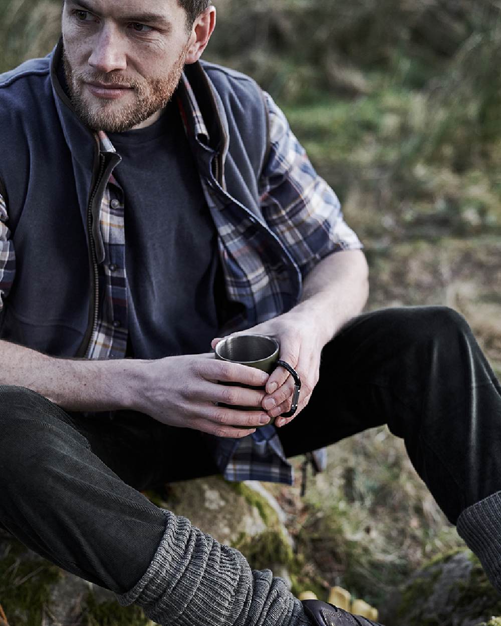 Slate Grey coloured Hoggs of Fife Stenton Technical Fleece Gilet on forest background