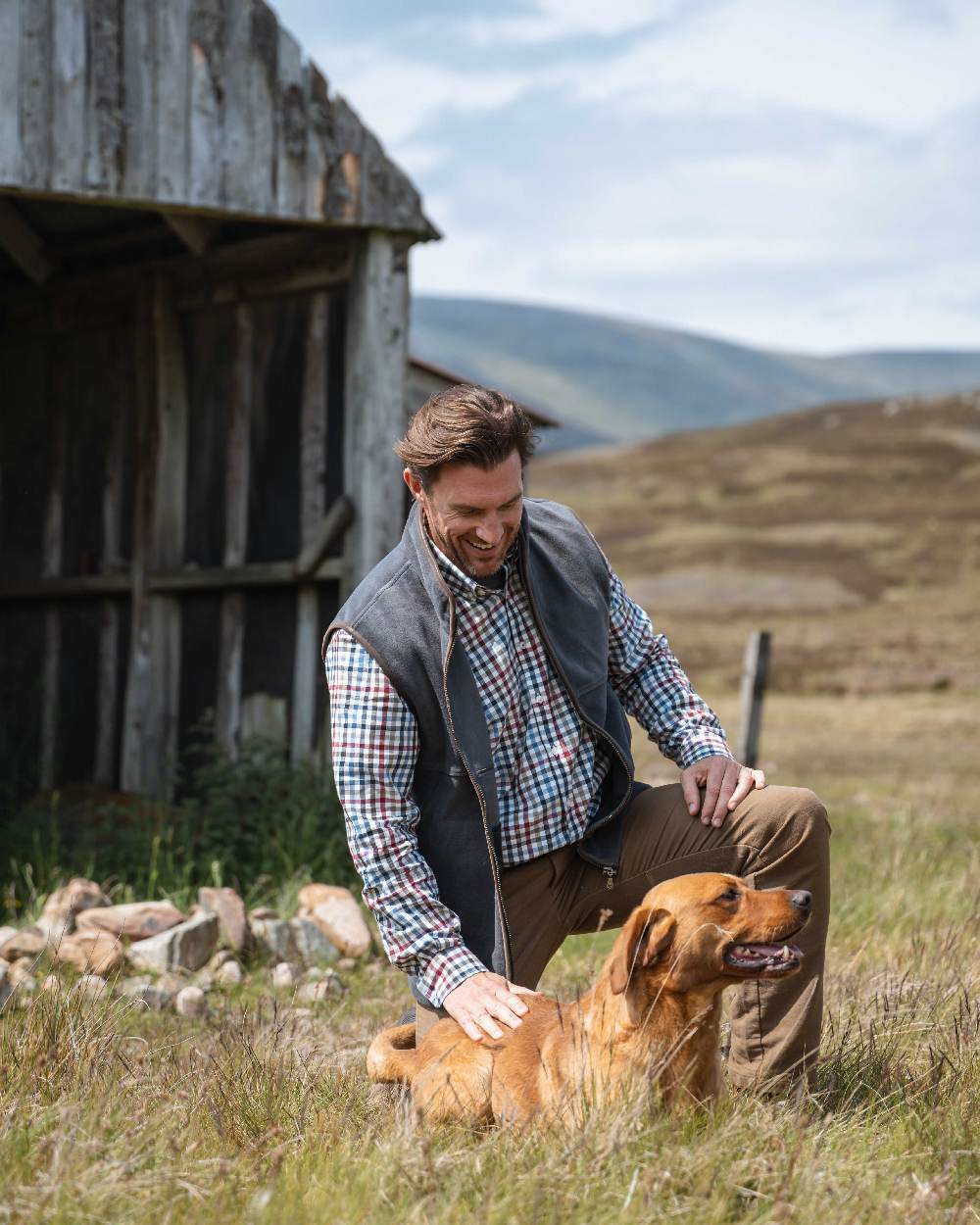 Slate Grey coloured Hoggs of Fife Stenton Technical Fleece Gilet on outdoor background