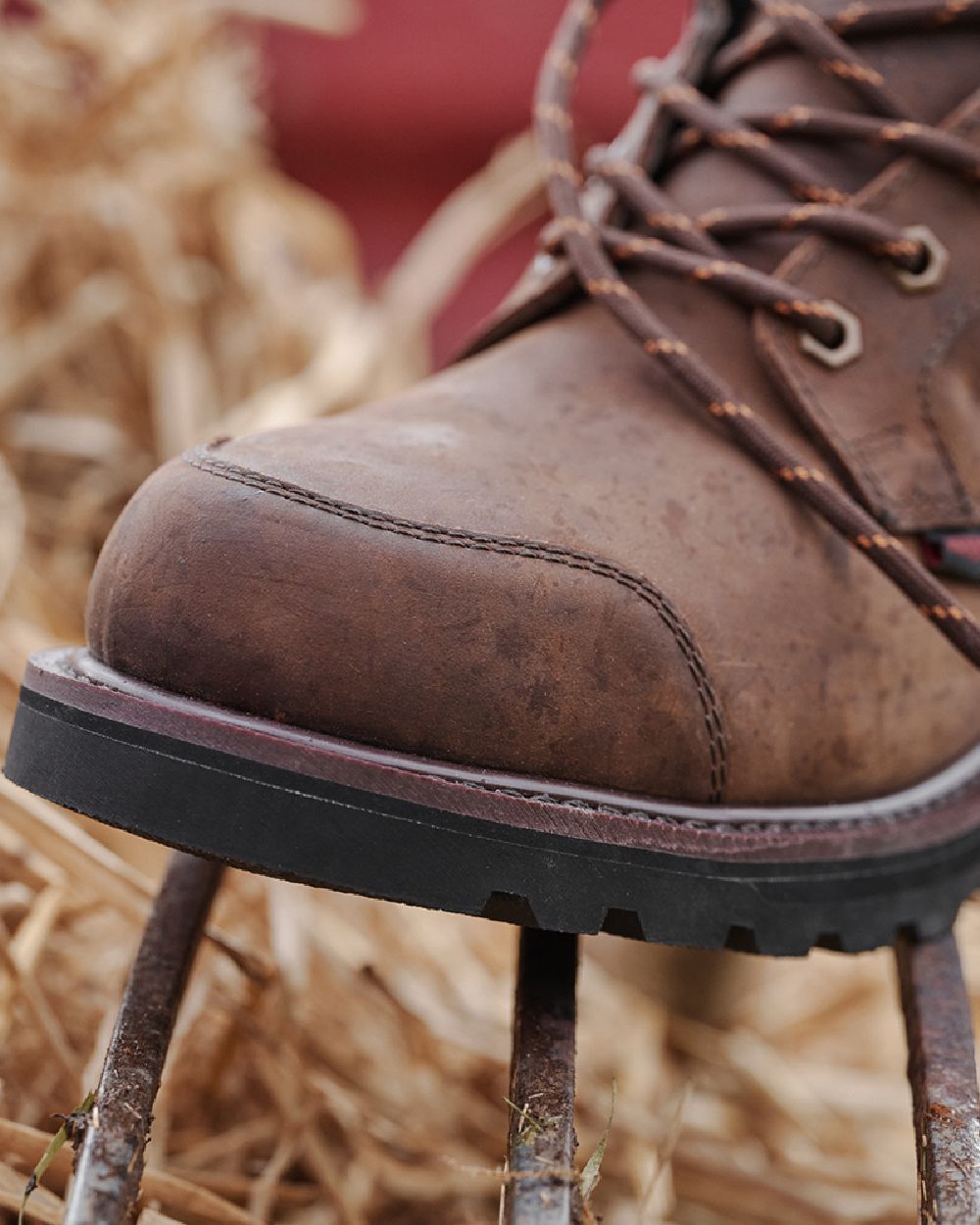 Crazy Horse Brown Coloured Hoggs of Fife Triton Pro Boots on grass background