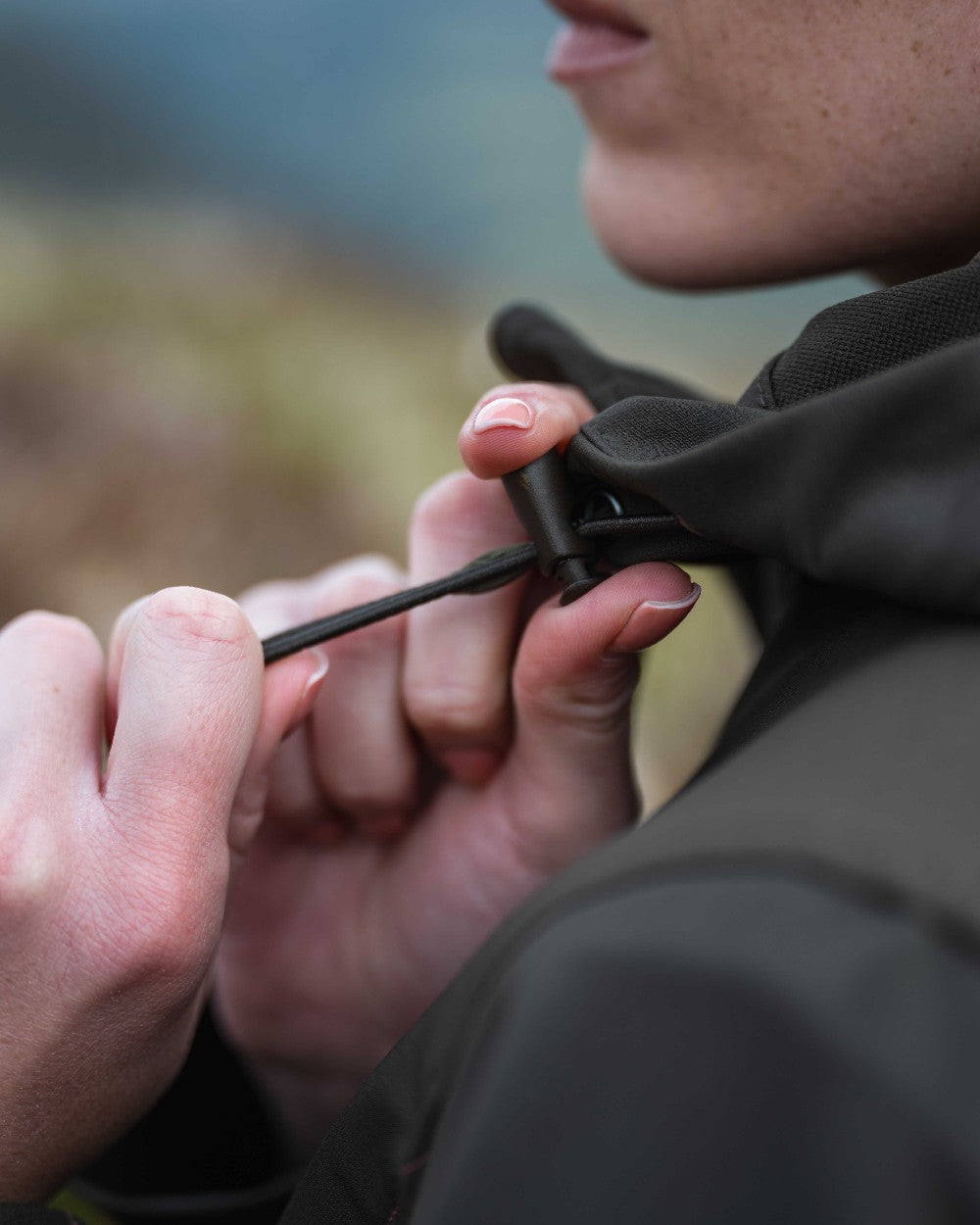 Green Coloured Hoggs of Fife Womens Ardross 4-Way Active Jacket on blur background