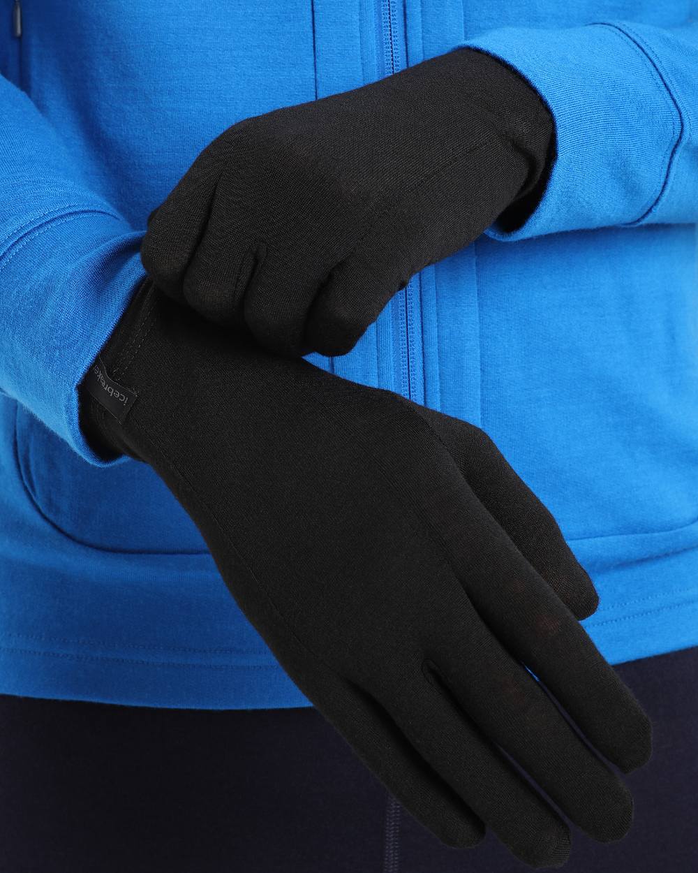 Black Coloured Icebreaker Unisex 200 Oasis Glove Liners on white background