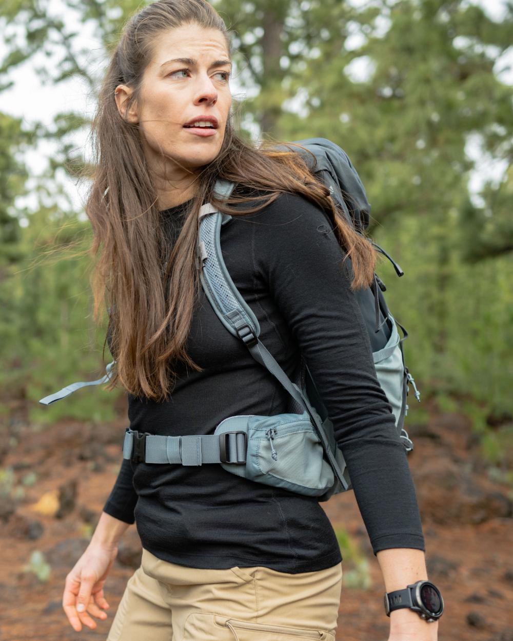 Black Coloured Icebreaker Womens Merino 200 Oasis Crewe Thermal Top on forest background