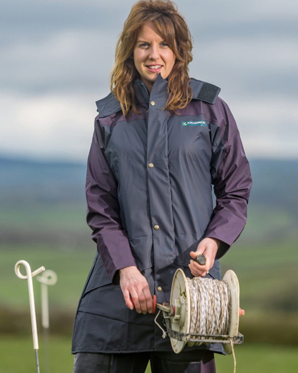 Navy coloured Kaiwaka Agtex Lady of the Land Parka on outdoor background