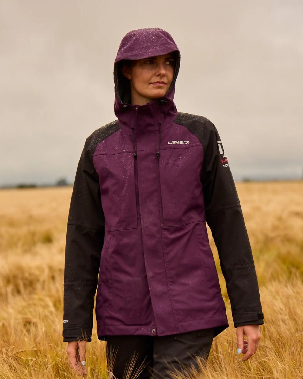 Blackberry Black Colour Line 7 Womens Territory Storm Pro20 Waterproof Jacket on farm background