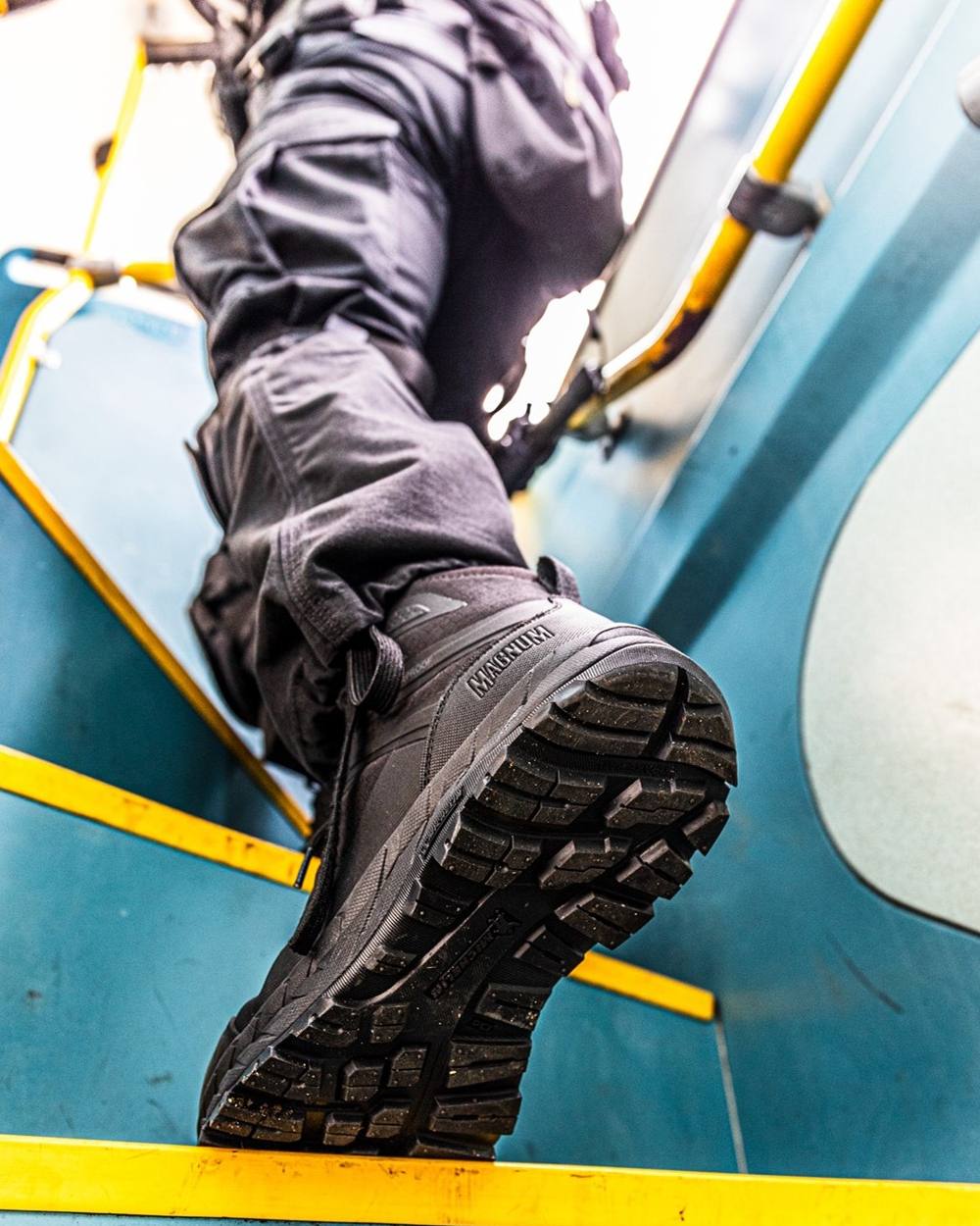 Black Coloured Magnum Ultima Pro 6.0 Waterproof Uniform Boots on outdoor background