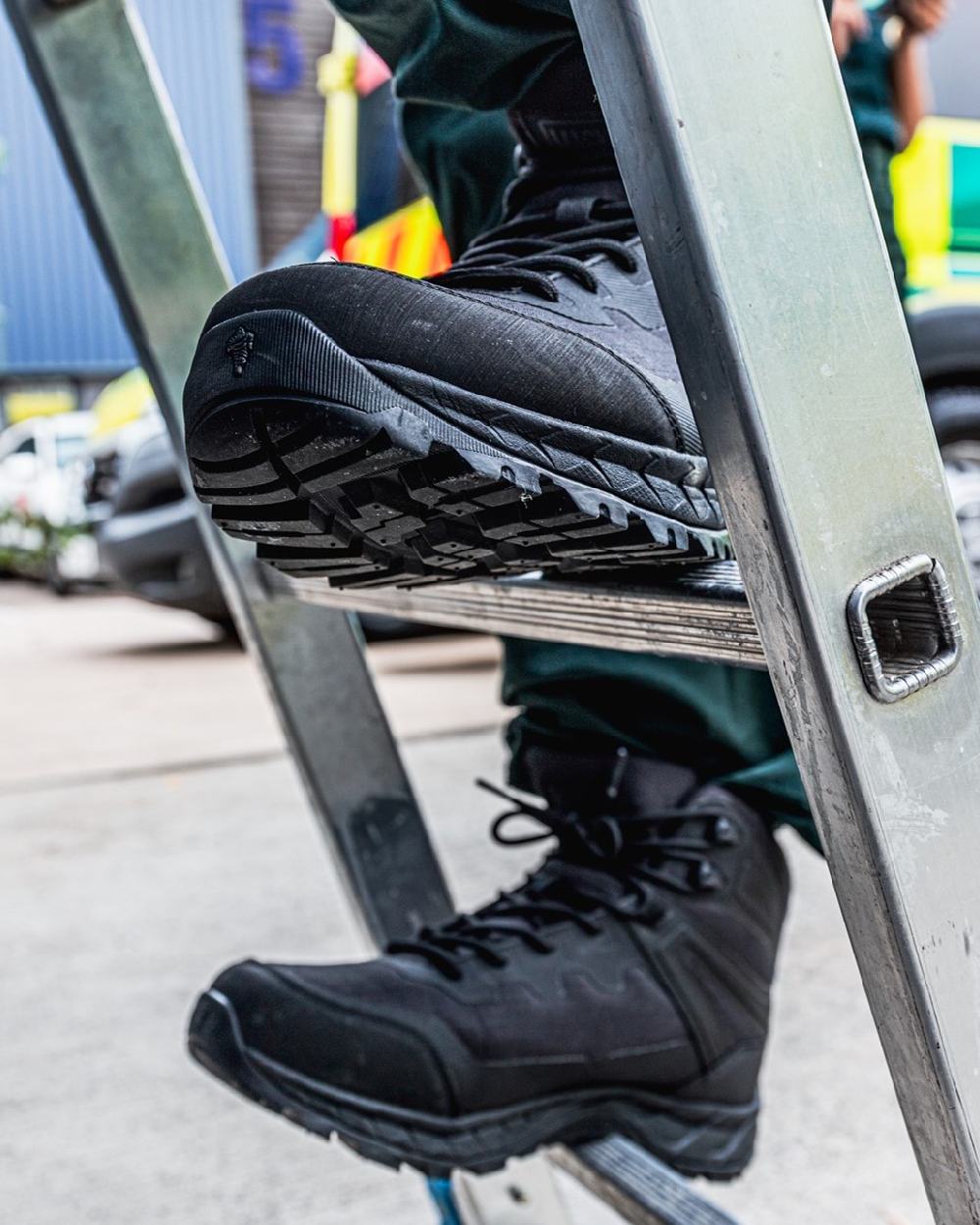 Black Coloured Magnum Ultima Pro 6.0 Waterproof Uniform Boots on outdoor background