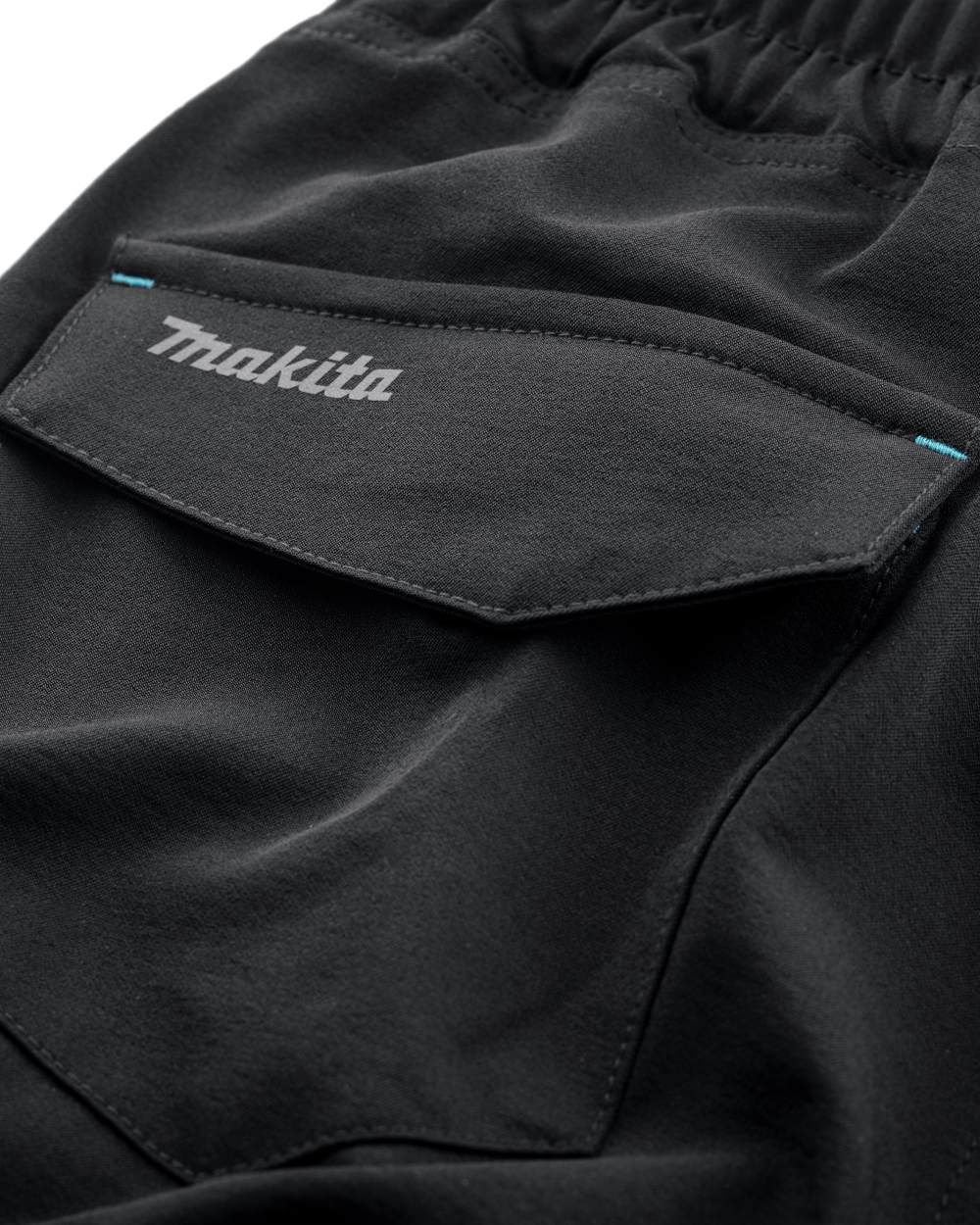 Black Coloured Makita Mens Axis Stretch Shorts on white background
