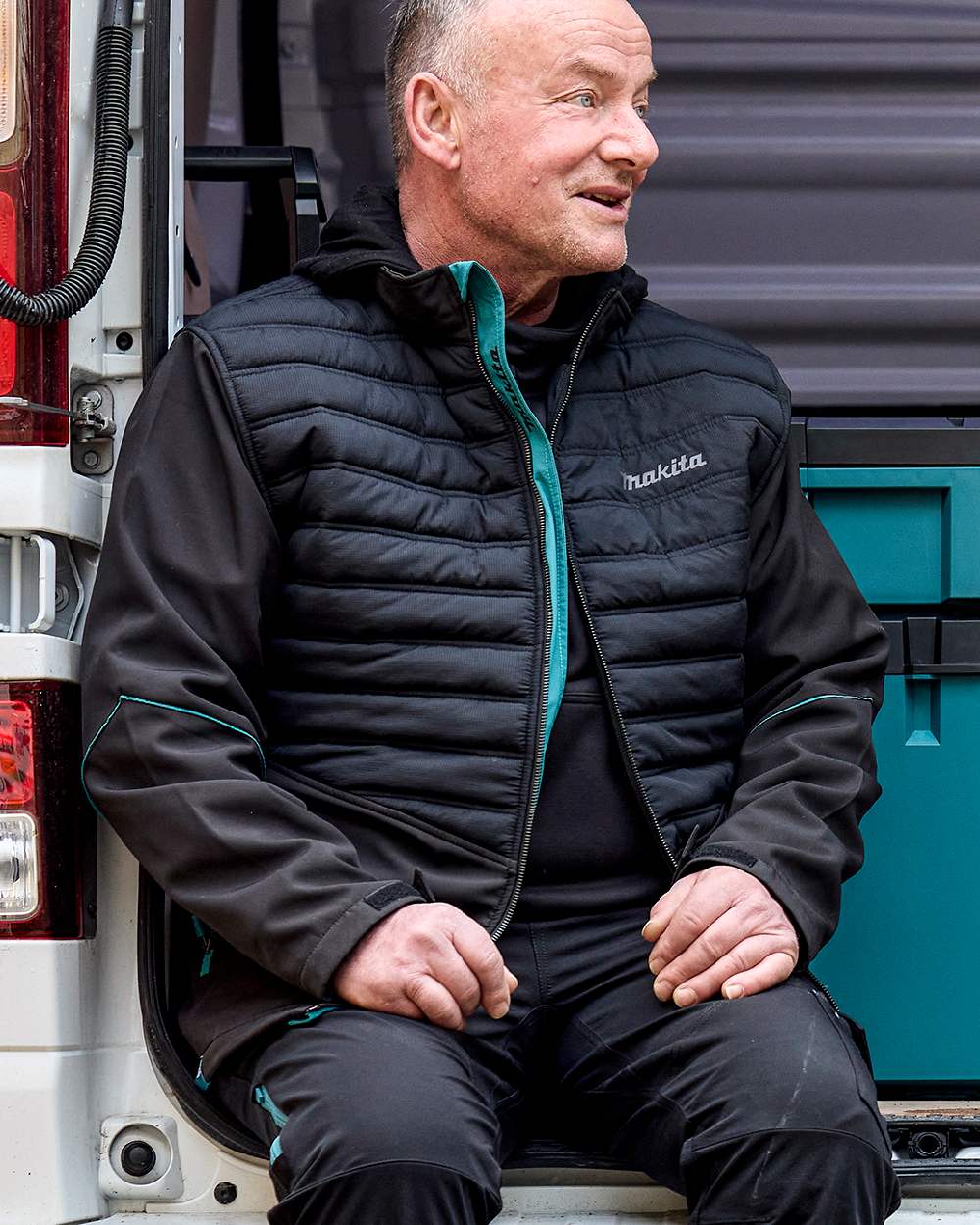 Black Coloured Makita Mens Shield Jacket on outdoor background