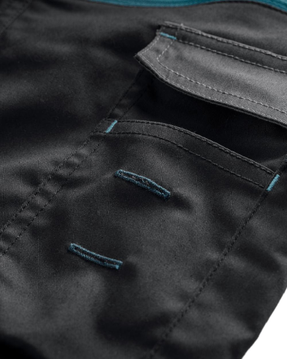 Black Coloured Makita Mens Vector Stretch Trousers on white background