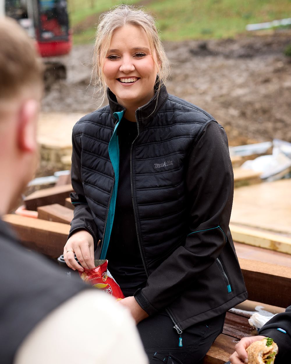 Black Coloured Makita Womens Shield Jacket on outdoor background