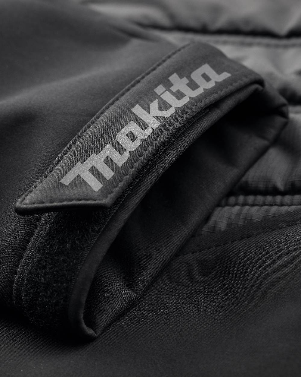 Black Coloured Makita Womens Shield Jacket on white background