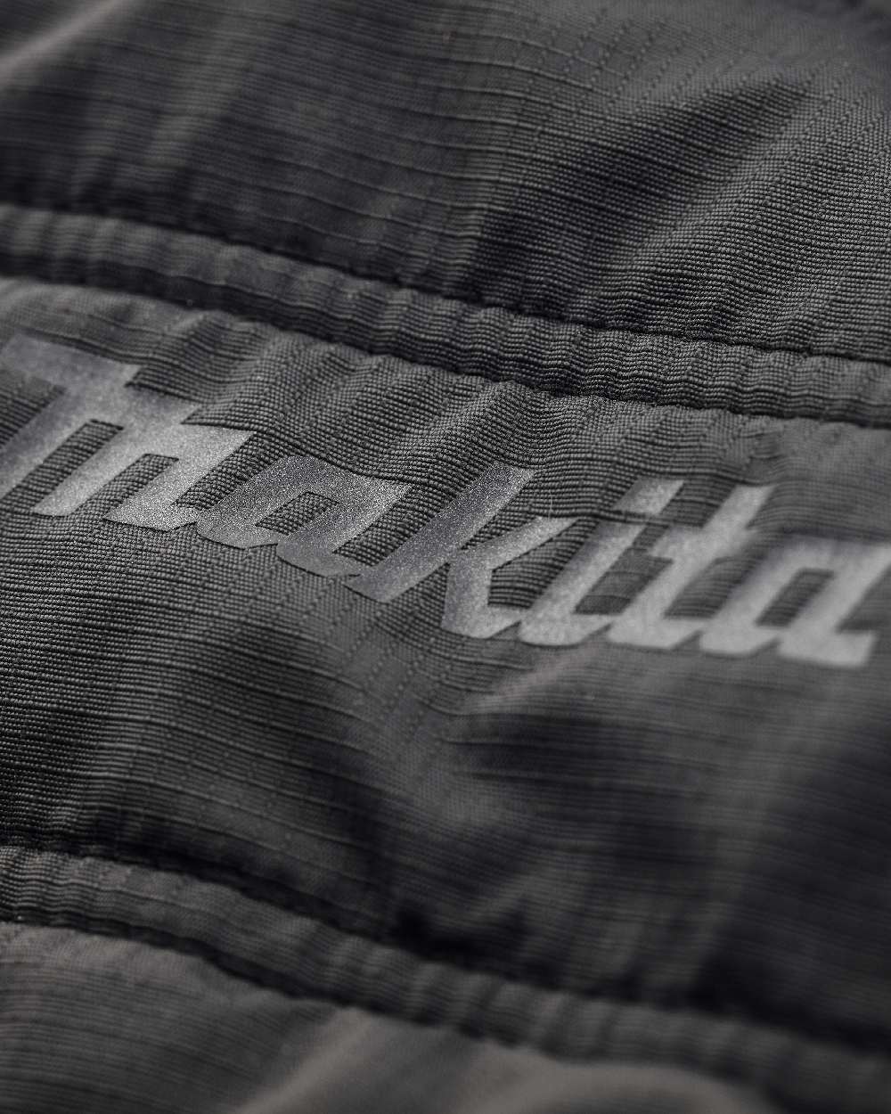 Black Coloured Makita Womens Shield Jacket on white background