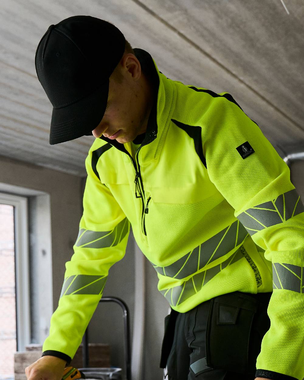 Black Coloured Mascot Workwear Customized Adjustable Cap on construction background