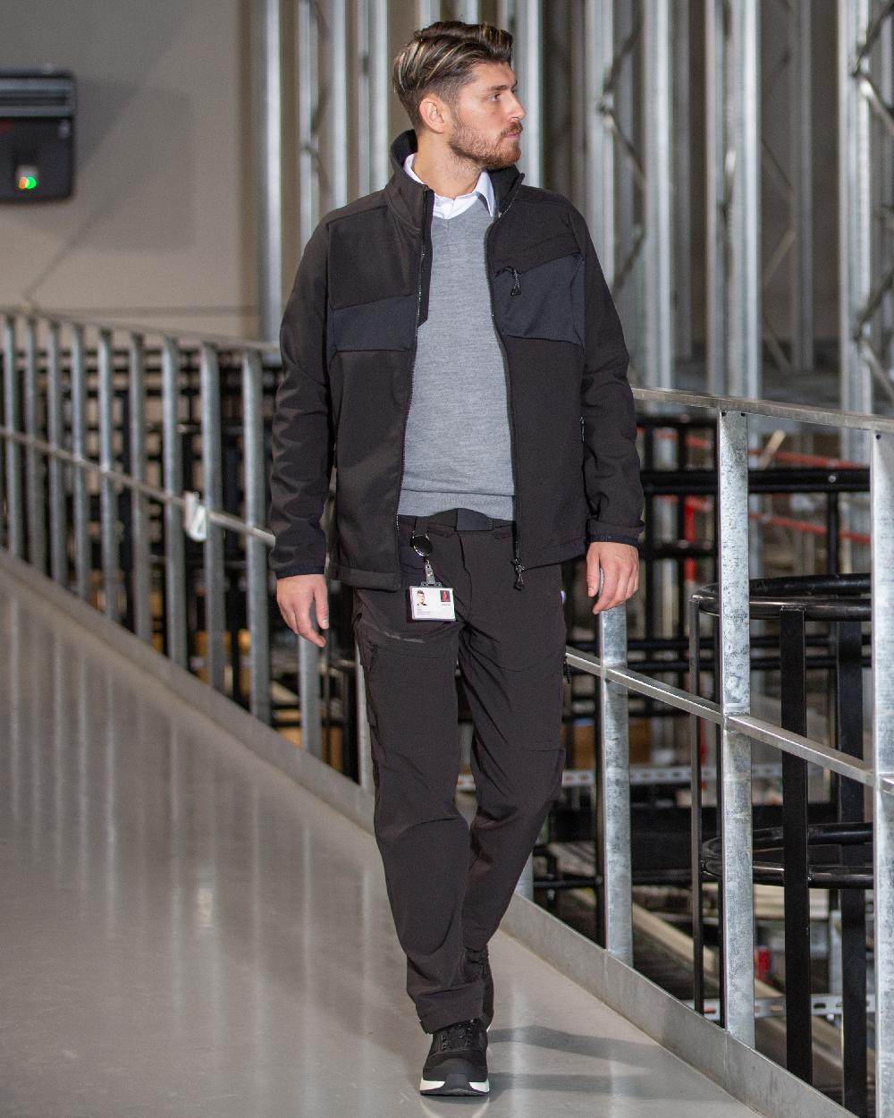 Black Coloured Mascot Workwear Mens Accelerate Breathable Softshell Jacket on factory background